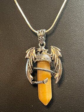 Pale Brown Simulated Crystal Encased by a Silvertone Dragon (330)